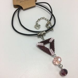 Handmade seed beads pendant on leather cord